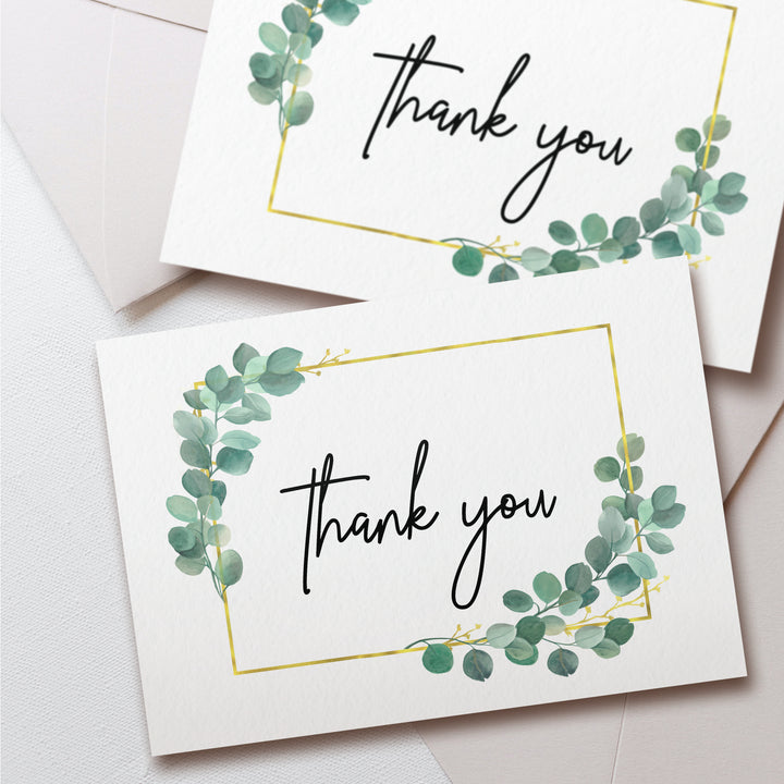 two thank you cards with green leaves on them