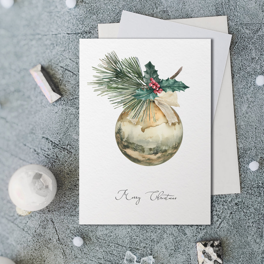 a card with a christmas ornament on it