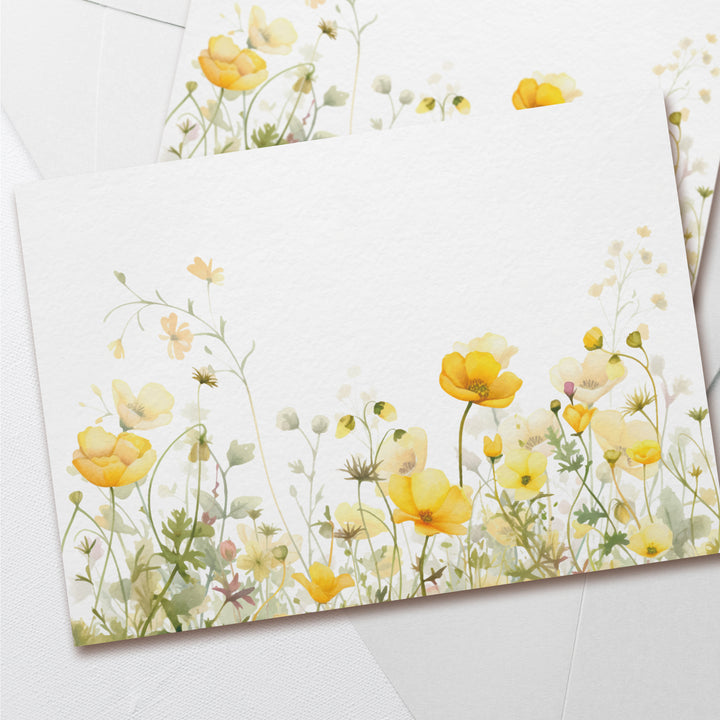 a close up of two cards with flowers on them