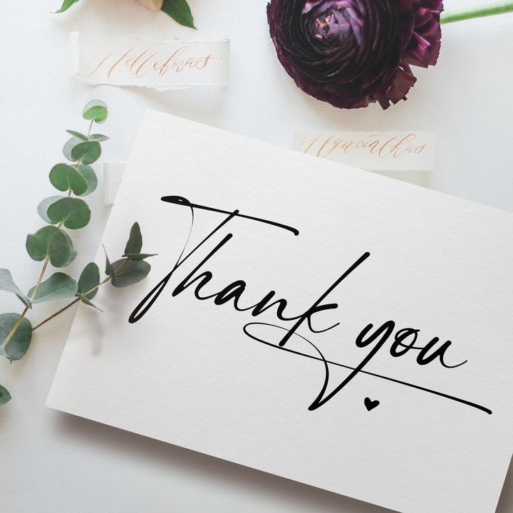 a thank card with the words thank you written on it