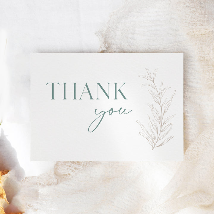 a thank you card with a plant on it