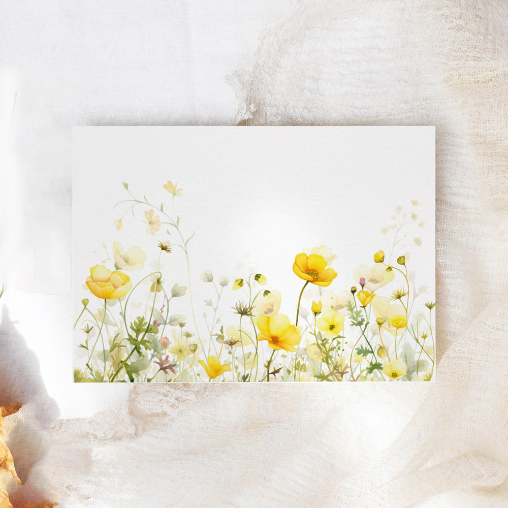 a white card with yellow flowers on it