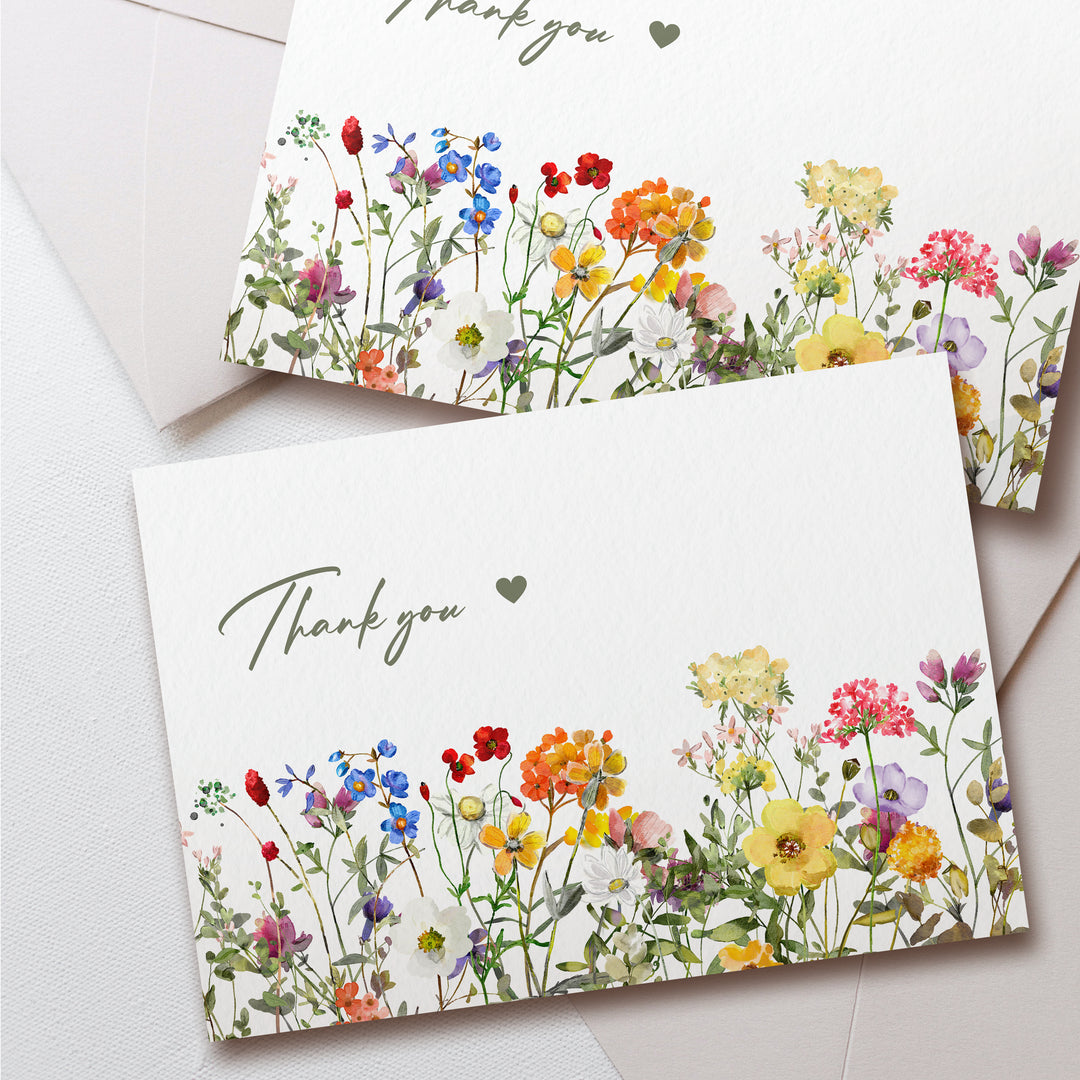 a couple of cards that have flowers on them