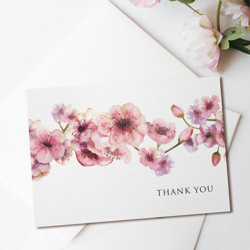 a thank you card with pink flowers on it