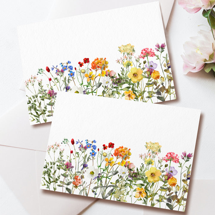 a couple of cards that have flowers on them