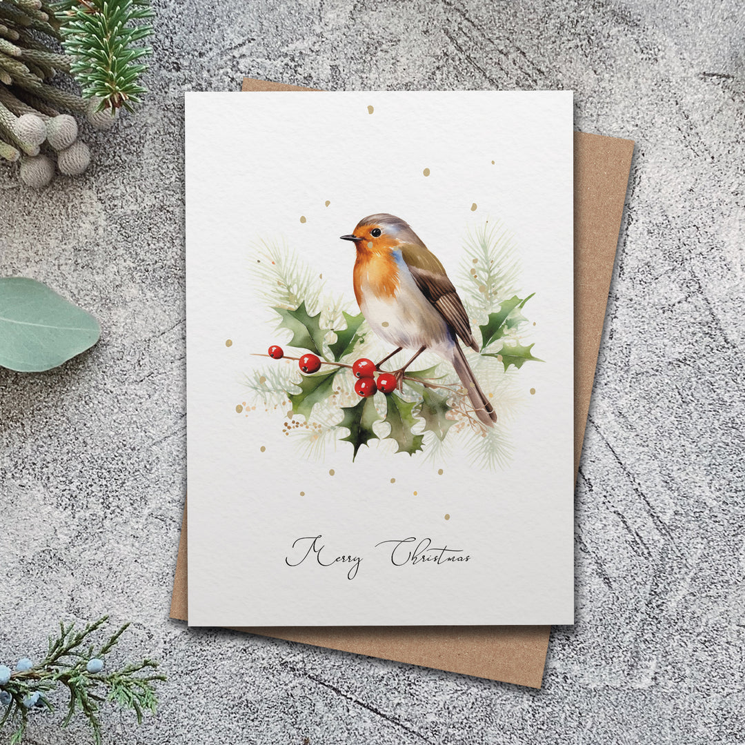 a christmas card with a bird and holly