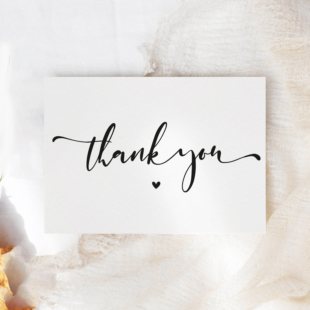 a thank card with the word thank you written on it