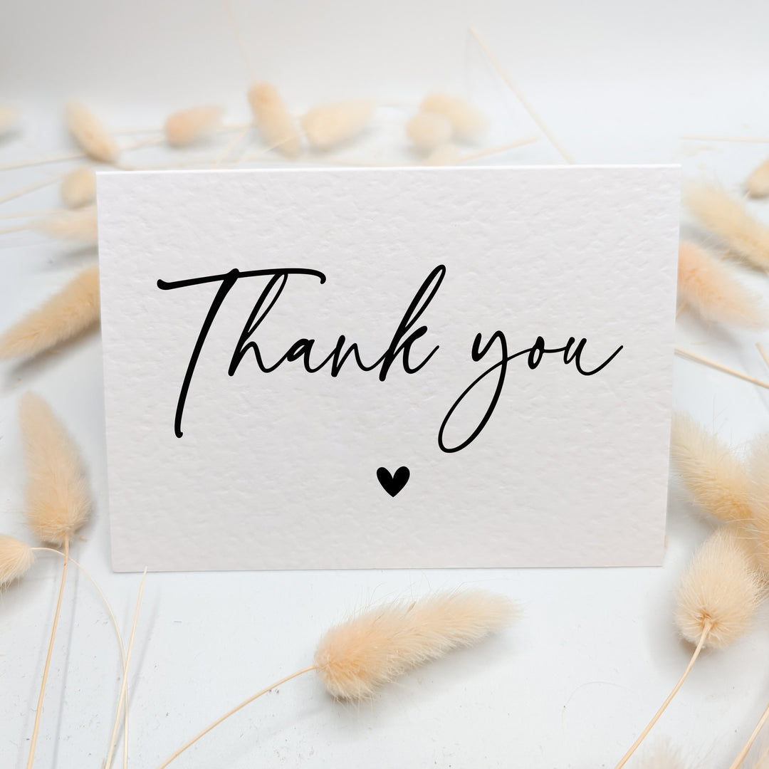 a thank card with the words thank you written on it