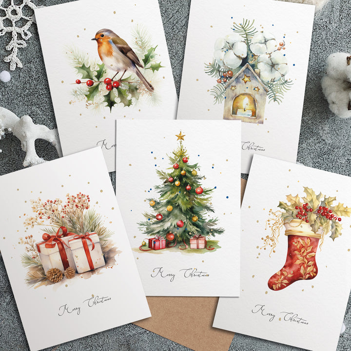 four christmas cards with a bird and a christmas tree