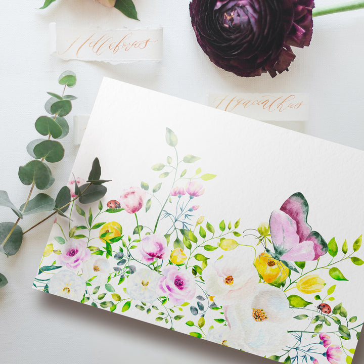 a close up of a card with flowers on it