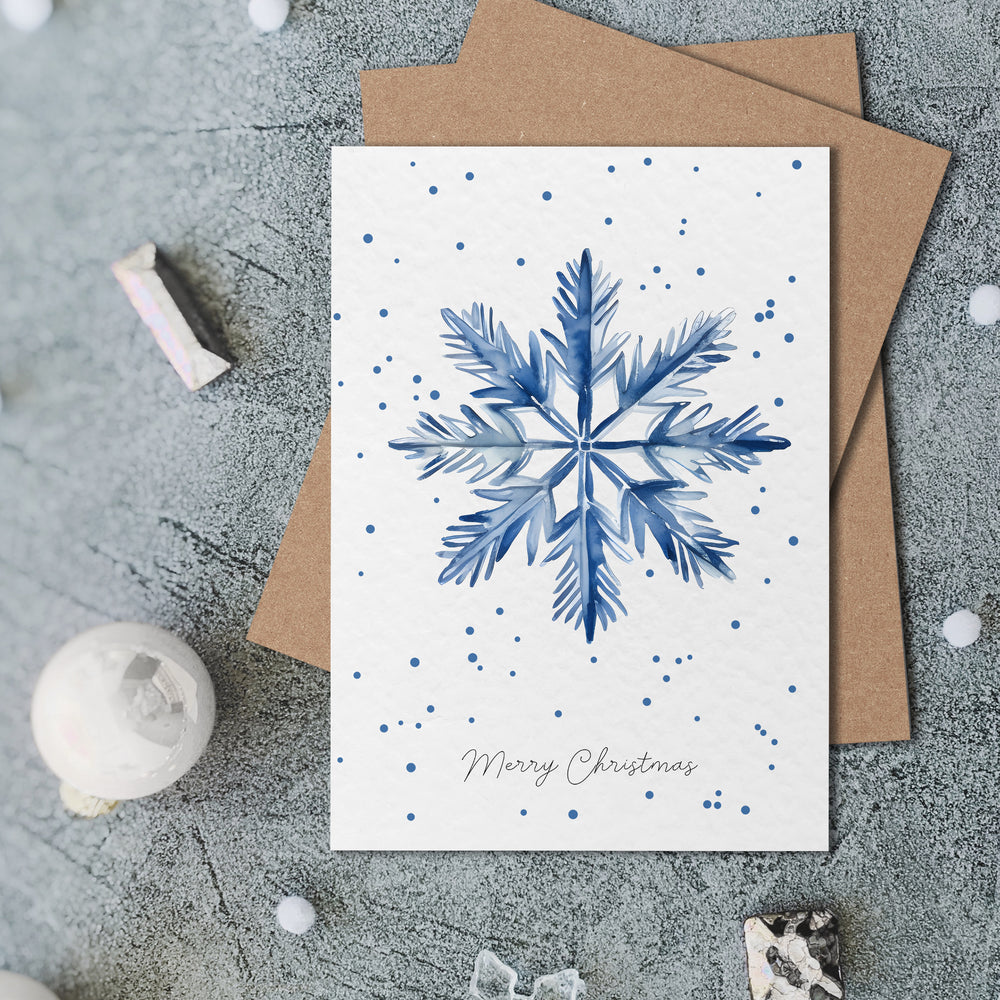 a card with a blue snowflake on it