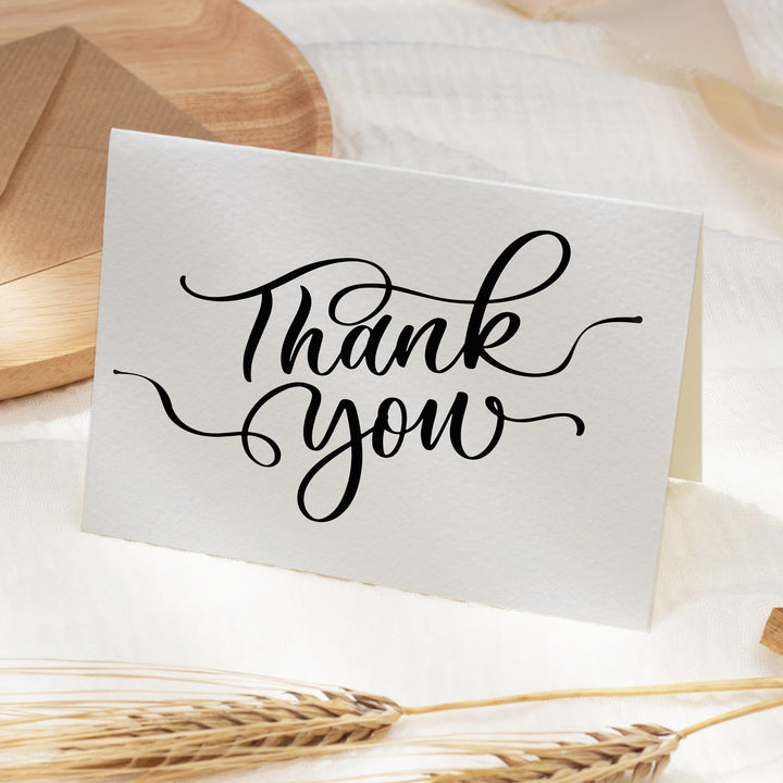 a thank card with the words thank you written on it