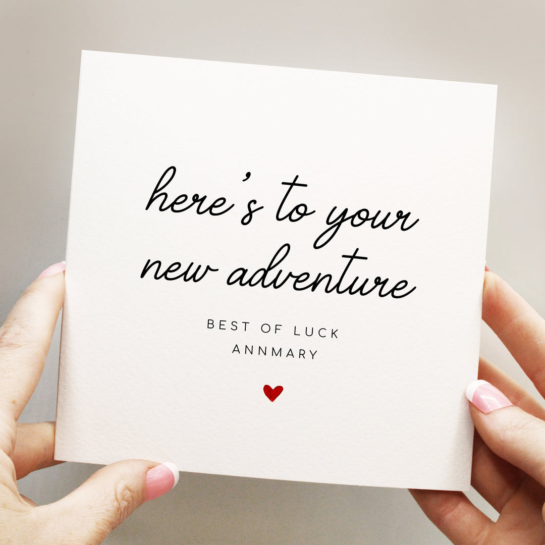 simple and elegant heres to your new adventure card with handwritten font and red heart