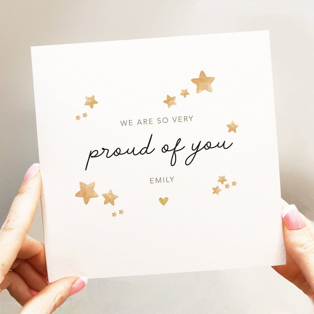 We&#39;re so proud of you, Personalised Congratulations Card, First New Job Card, Graduation, Well done, Cute Encouragement Card we are so very proud of you card with neutral stars and a little heart and handwritten font. Personalised with name